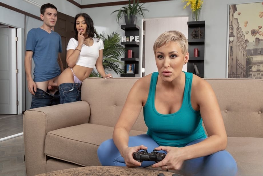 Short haired cougar Ryan Keely and gorgeous teen Jeni Angel share a huge dong