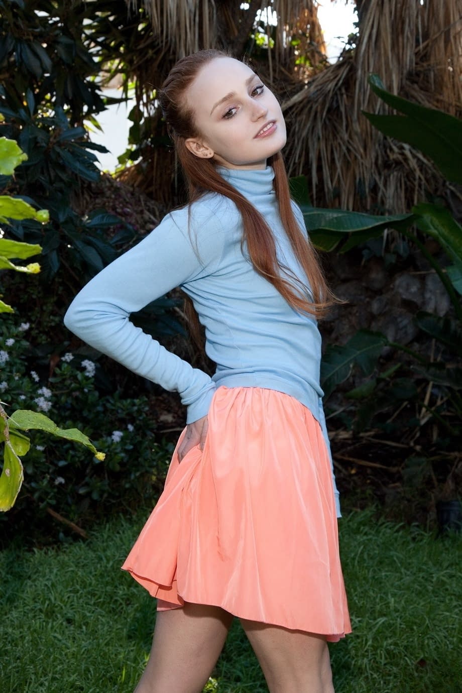 Stunning redhead teen Sarah Rupe flashing an upskirt in white panties outdoors