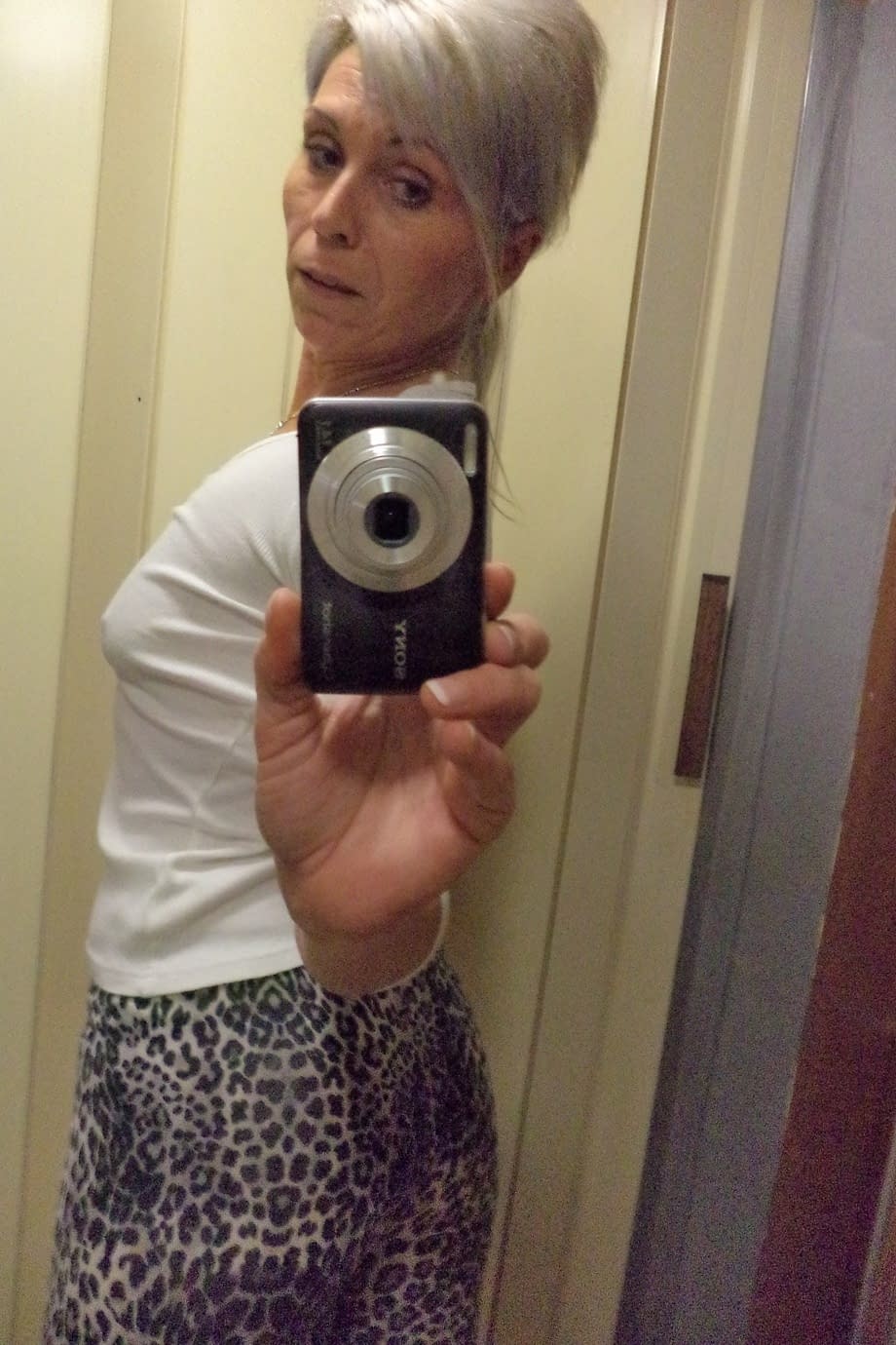 Czech lady Kathy White taking selfies in the mirror while stripping