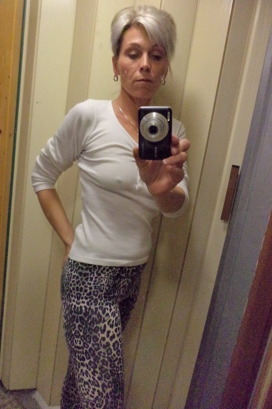 Czech lady Kathy White taking selfies in the mirror while stripping