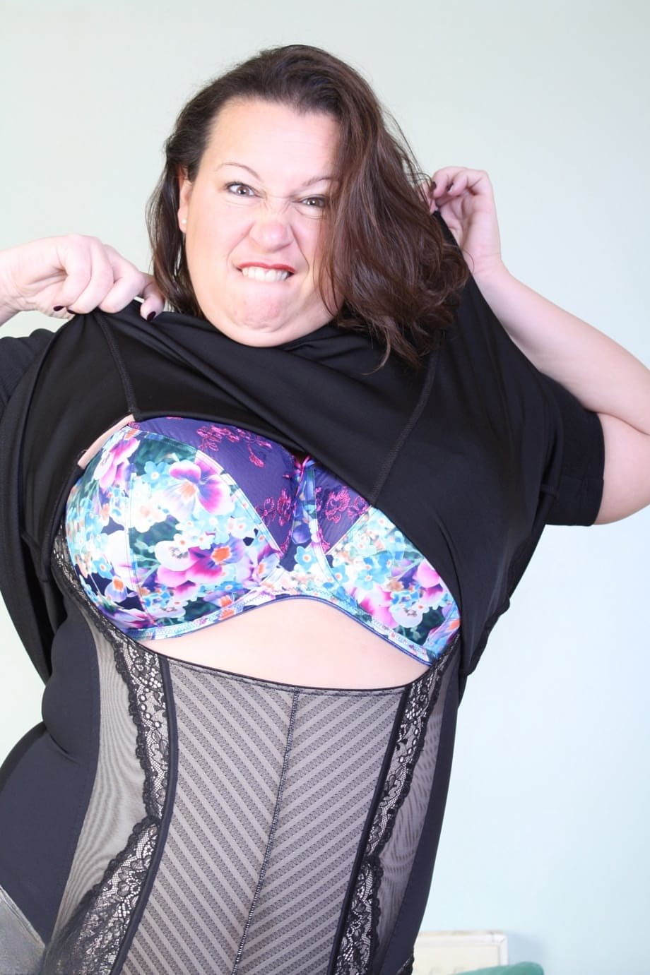 Brunette mom Eva Jayne removes her black dress and flaunts her curves