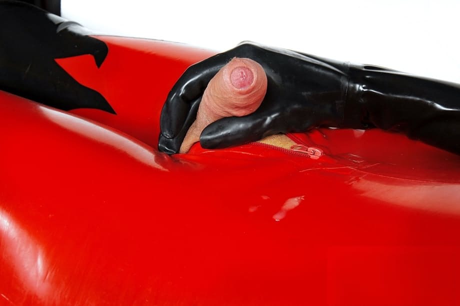 Buxom shemale Sabrina Sherman wanks while tempting in a latex outfit