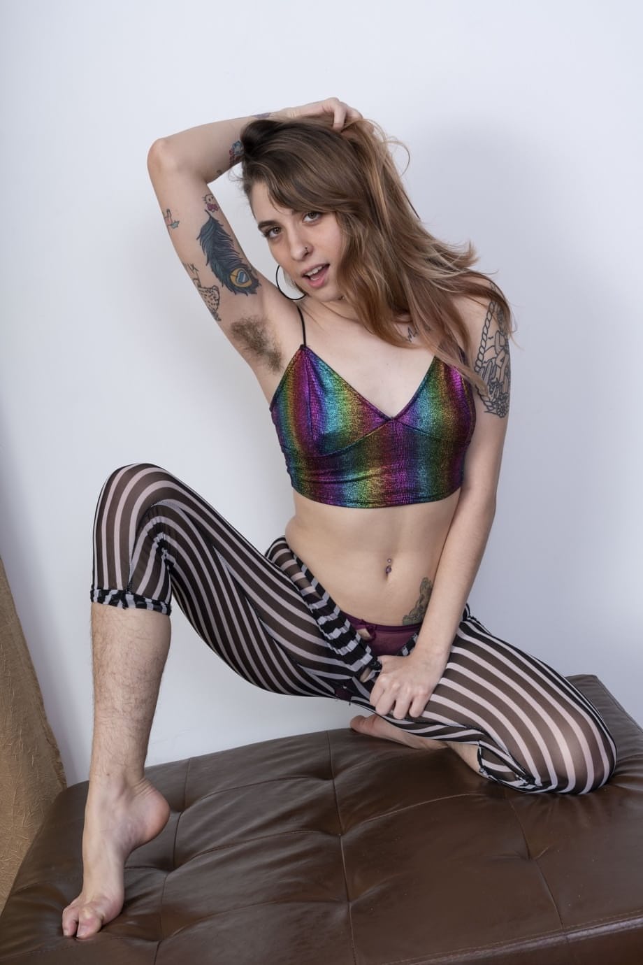 Tattooed amateur Pearl Sage flaunts her hairy twat and big ass in solo action