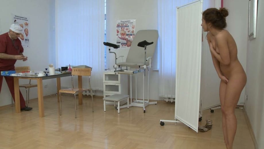 Redheaded teen Lara takes her gyno's stiff rod from behind at the clinic