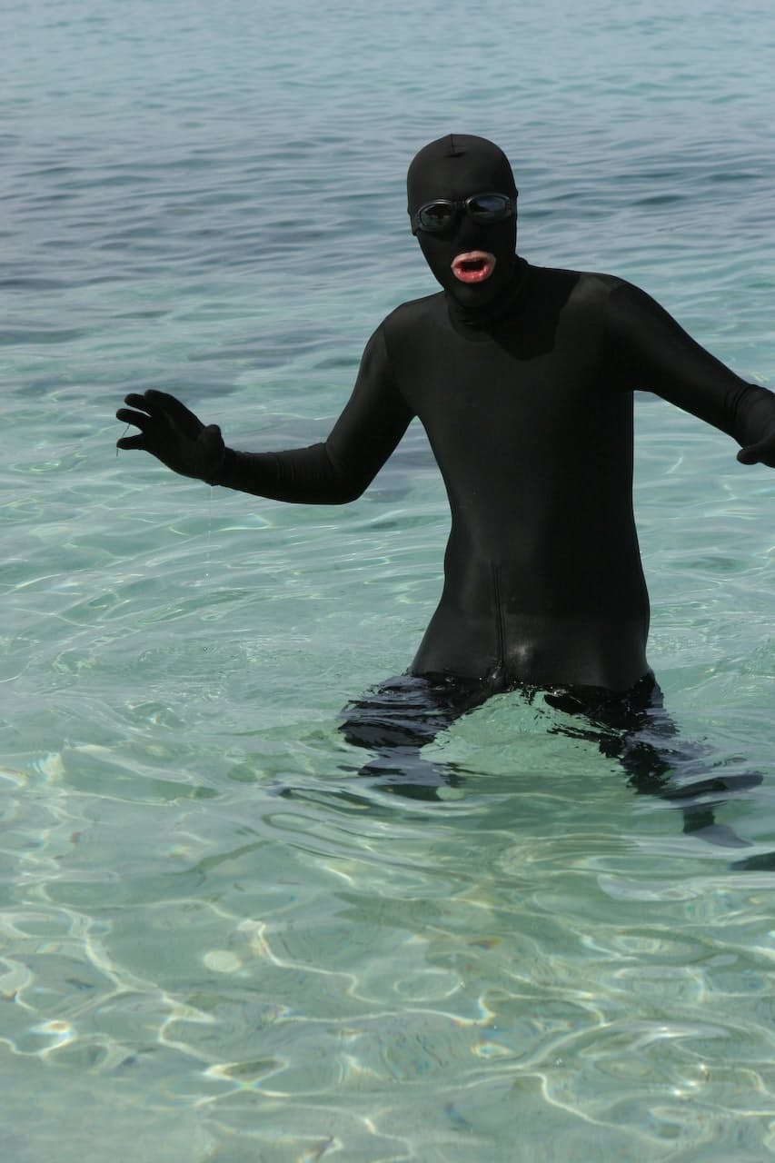 Smoking hot shemale babes going topless and posing in the sea water