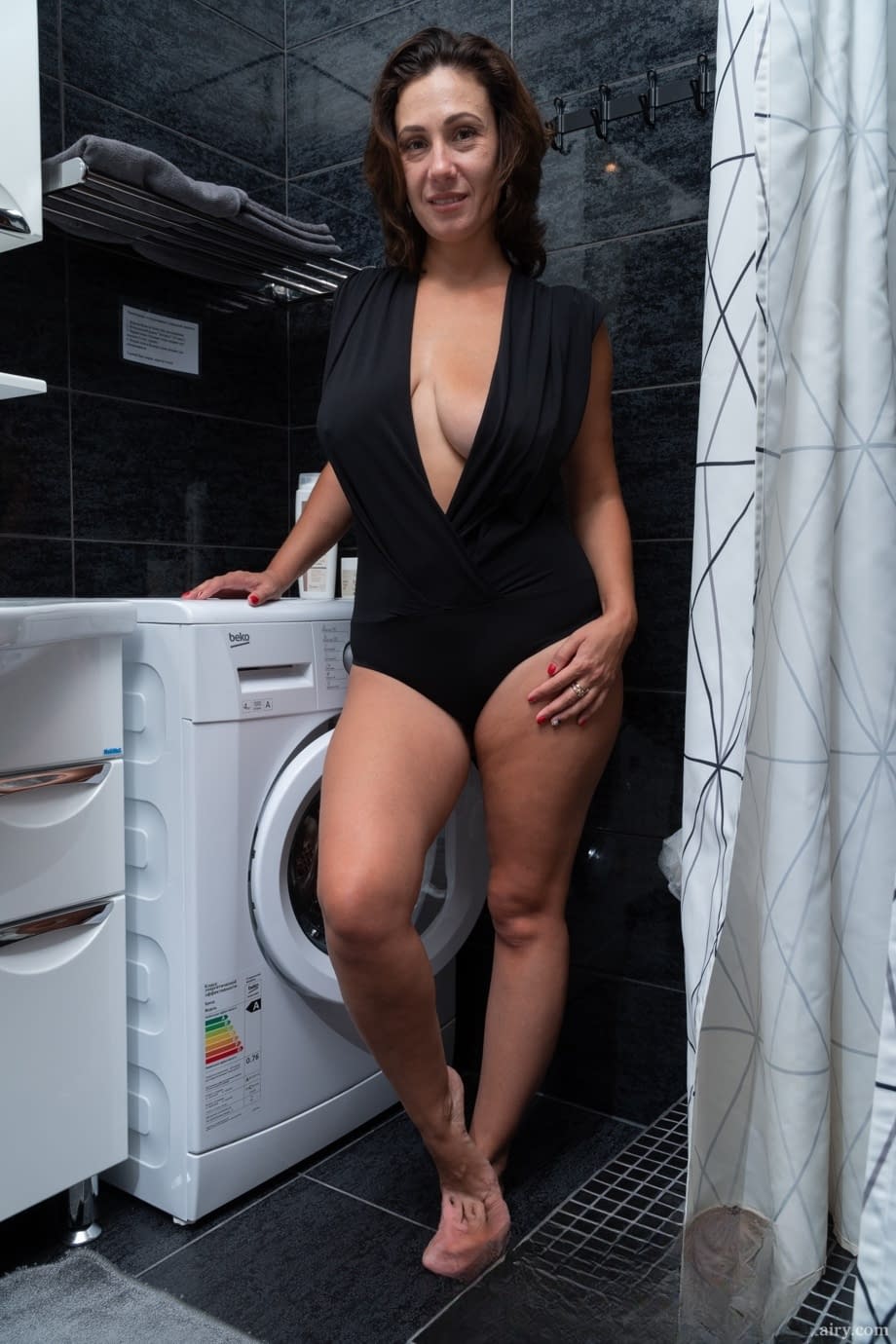 Hot cougar Gadget exposes her big breasts and fingers her hairy vagina
