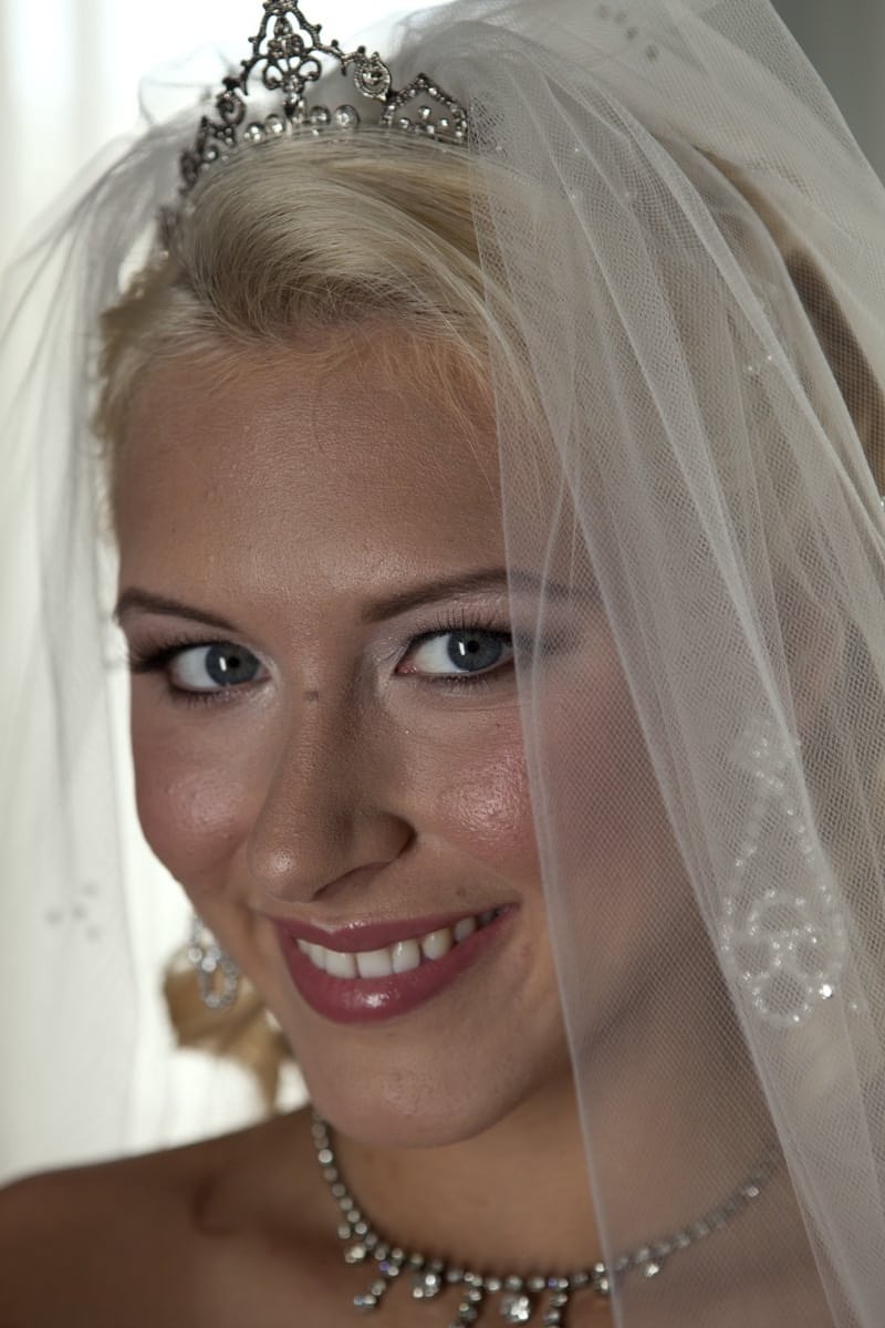 Blonde bride Katie Summers doffs her wedding dress & poses topless in lingerie