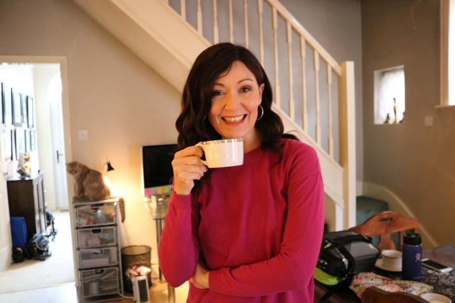 Sexy MILF Kitty Cream models for a non-nude shoot while at home and alone