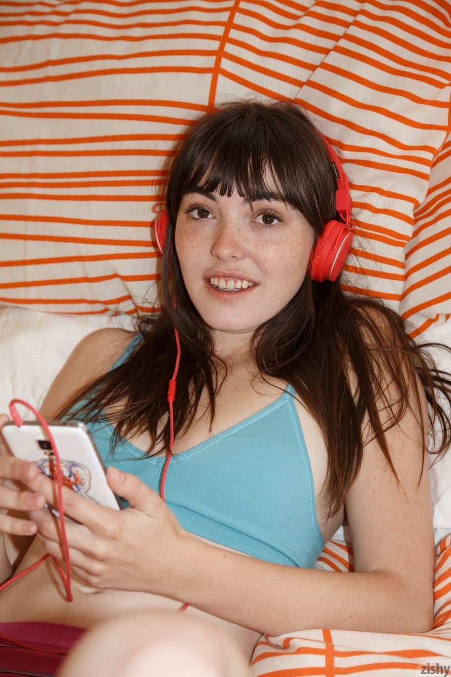 Nerdy girlfriend Debbie Vogel takes off her bra and panties to go naked
