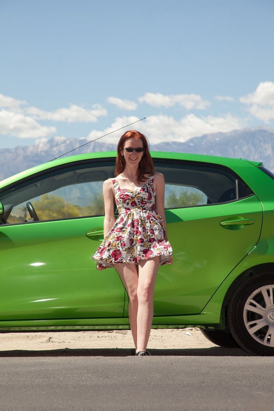 Crazy amateur redhead Dee Dee Lynn flashes her tits and red panties in public