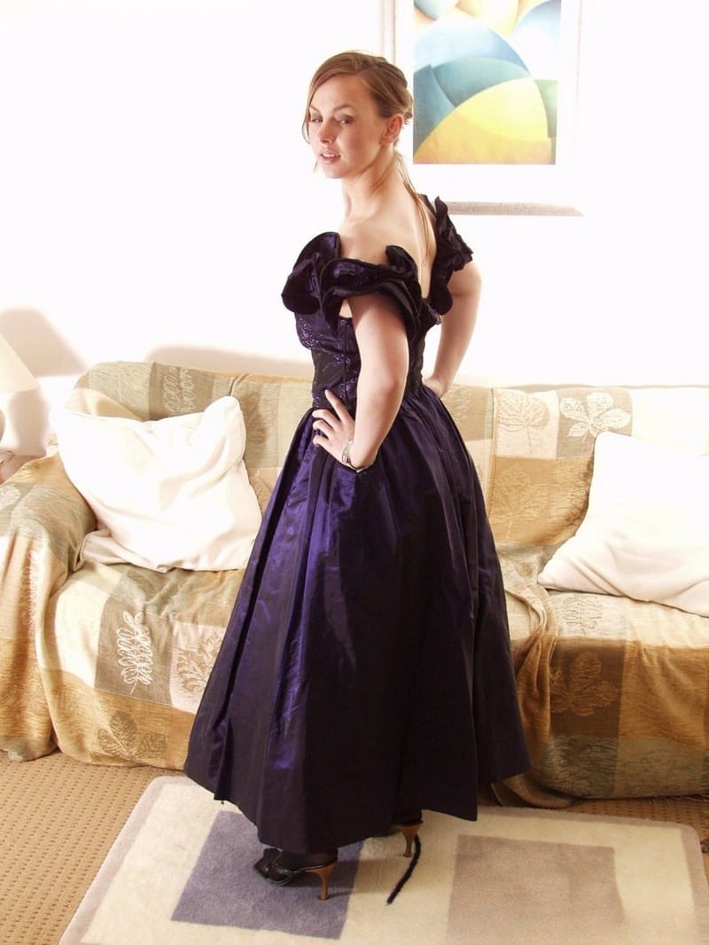 Big titted lady Claire doffs her elegant dress and teases with her perfect ass