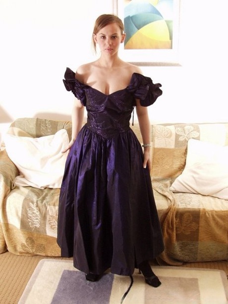 Big titted lady Claire doffs her elegant dress and teases with her perfect ass