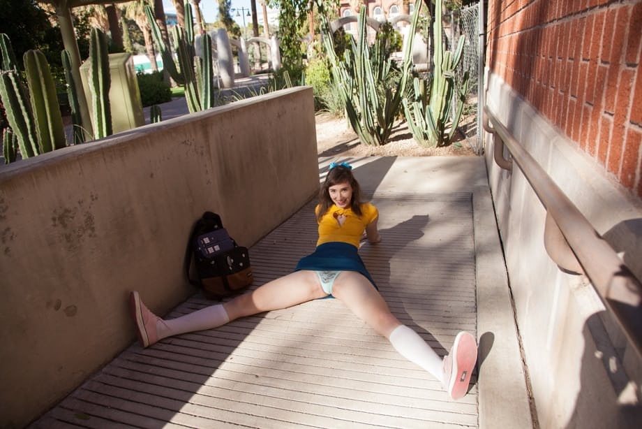 Nerdy but provocative-looking girl Yvette Nolot surprises with upskirt view