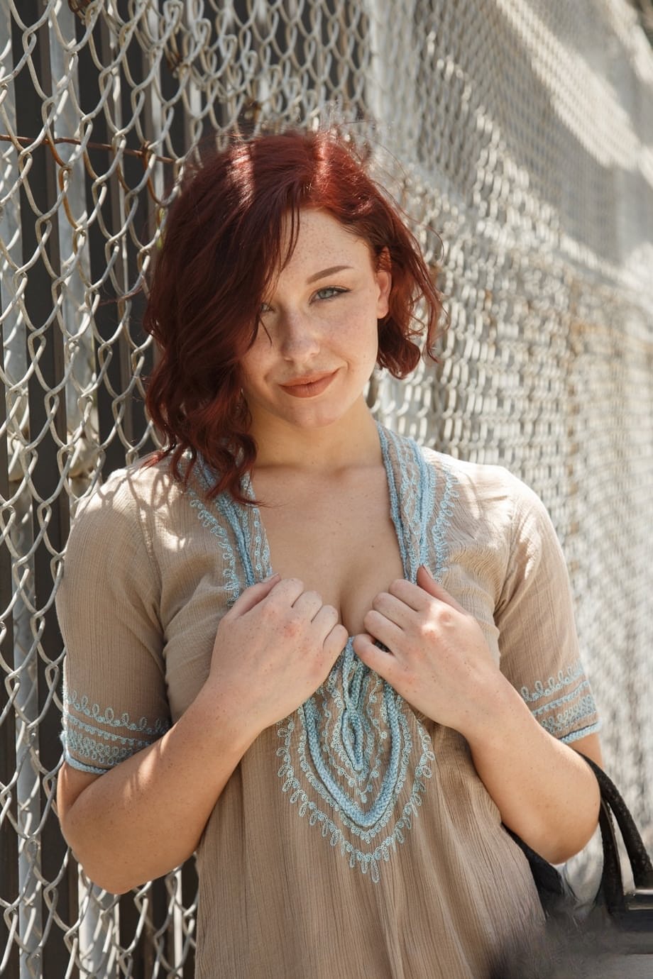 Natural redhead Spencer Bisson pulls down her panties after getting in a car