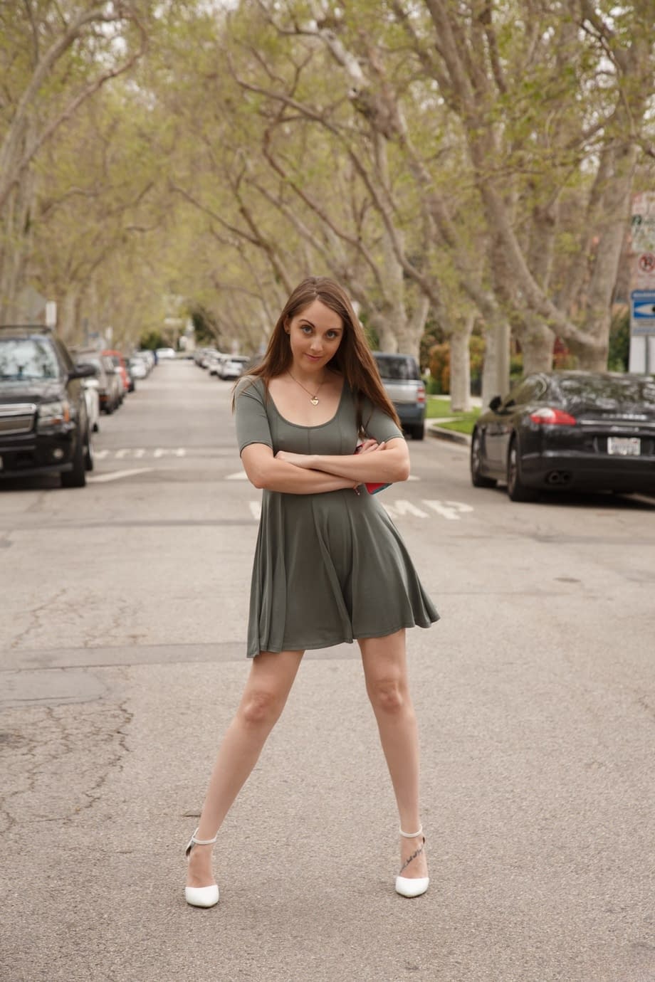 Naughty brunette Nickey Huntsman flashes her tits and ass while out in public