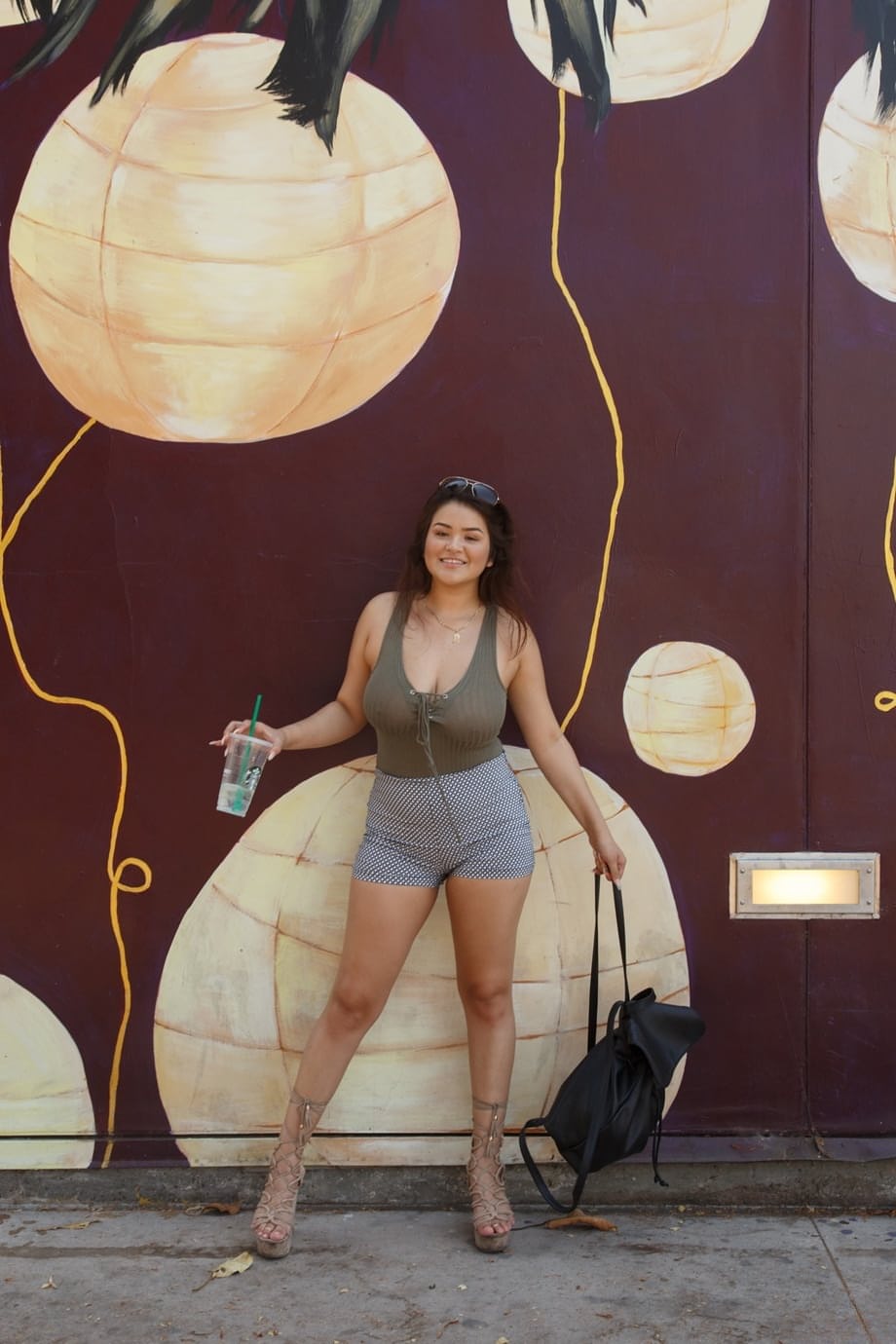 Thick Mexican girl wanders around the city flashing cleavage here and there