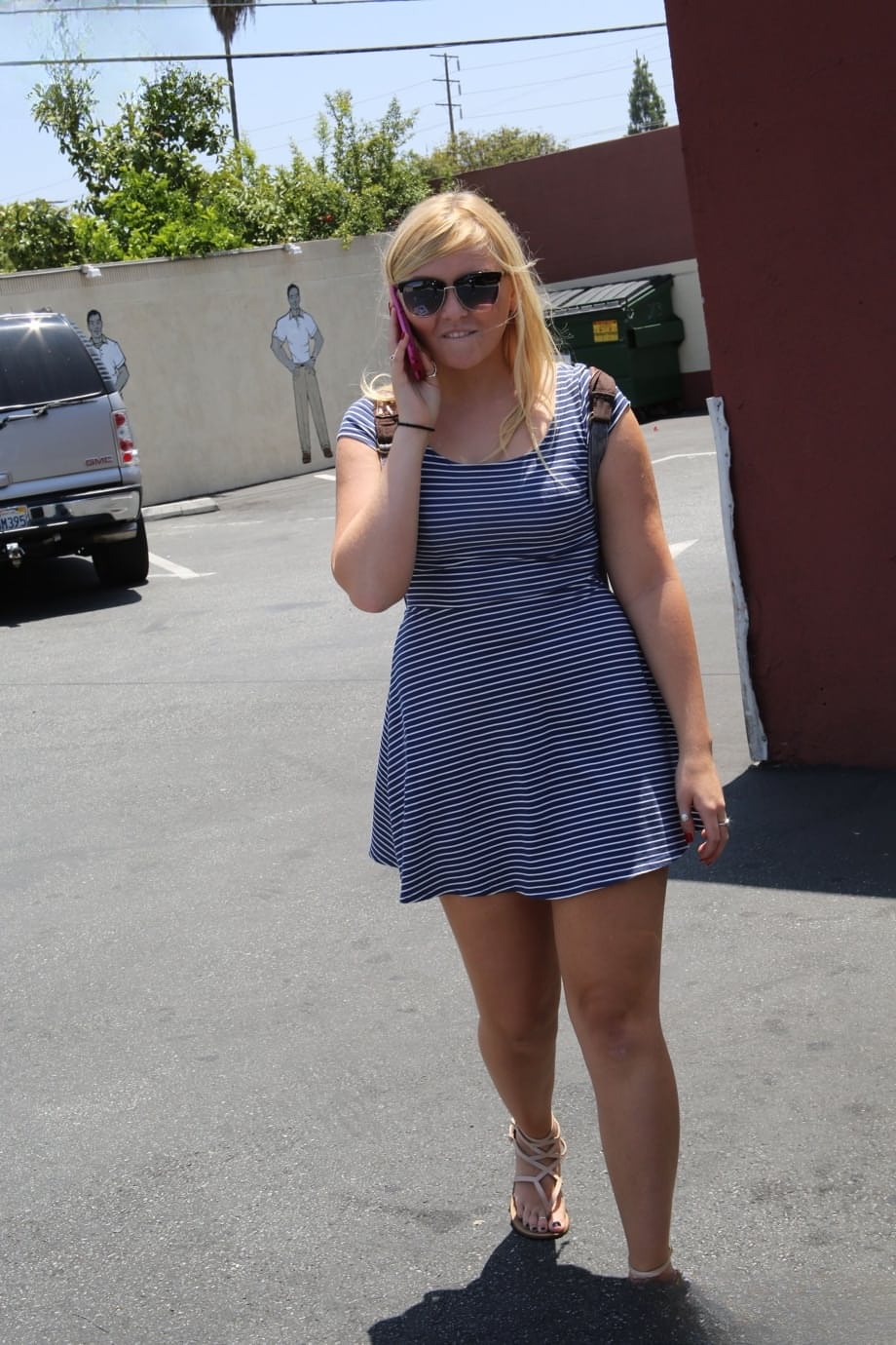 Chubby chick Melissa May gets naughty and shows off her thick sexy ass