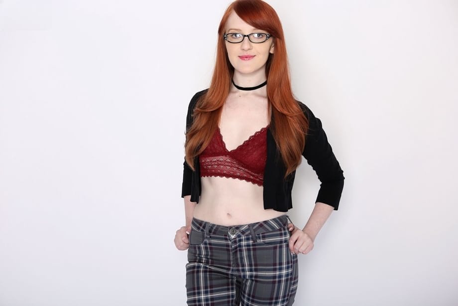 Nerdy redheaded teen Krystal Orchid gets penetrated by a large cock after