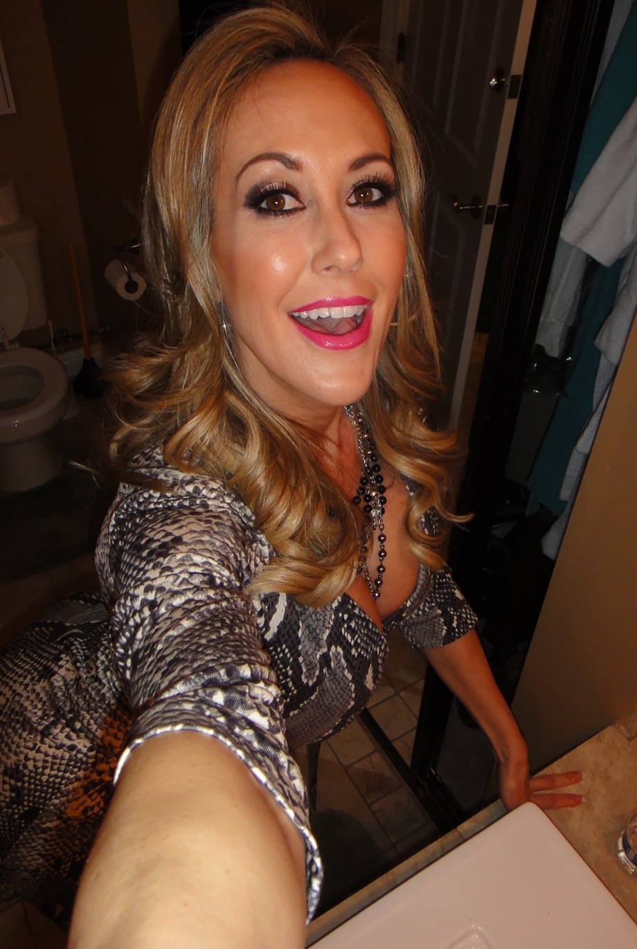 Happy MILF Brandi Love flashing hot ass & big tits preparing for porn shoot
