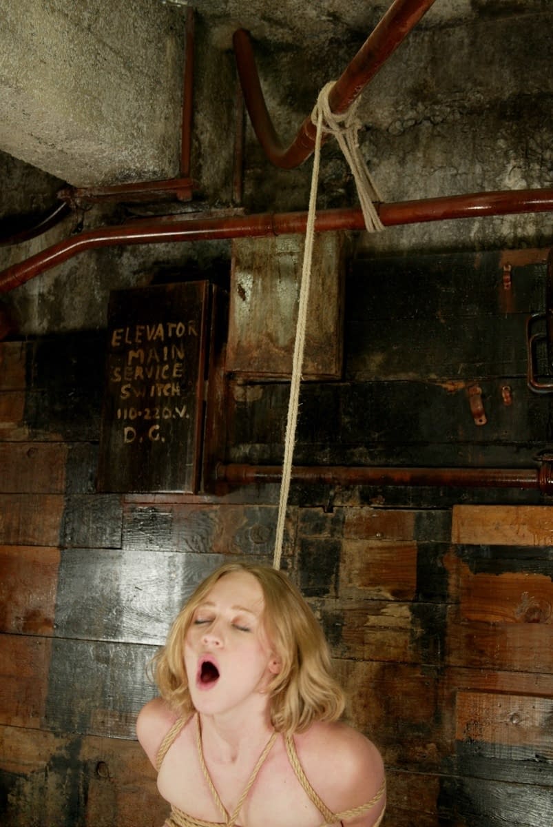 Tied-up female Cloe Hart endures tit torment in tight rope bondage