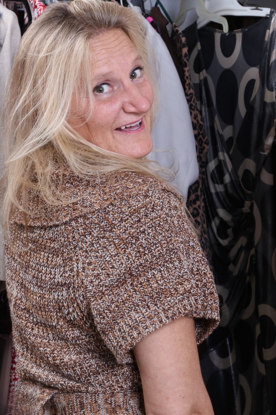 Mature Mary K takes off her clothes and masturbates with a dildo