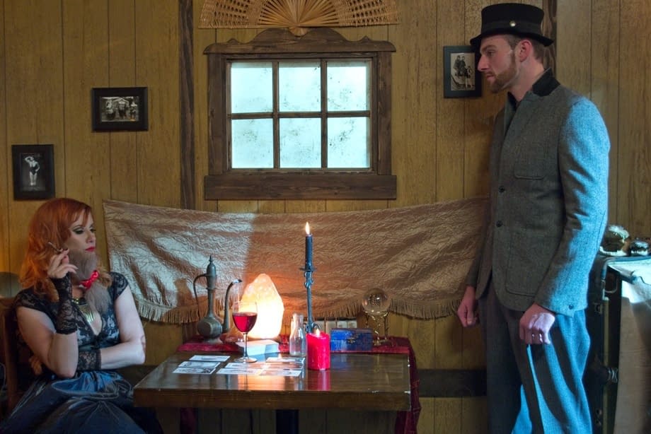 Fortune teller Maitresse Madeline Marlowe jerks cock while foretelling future