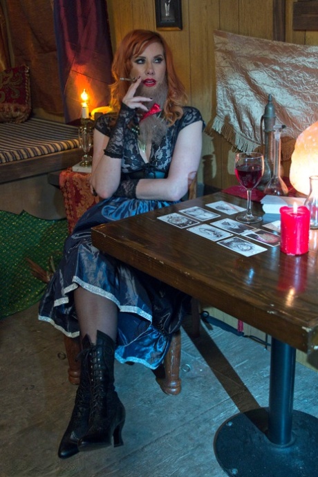 Fortune teller Maitresse Madeline Marlowe jerks cock while foretelling future