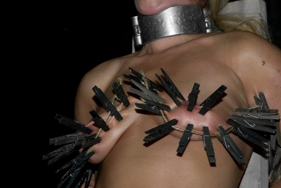 Naked blonde chick Dia Zerva is covered in clothespins in a dungeon