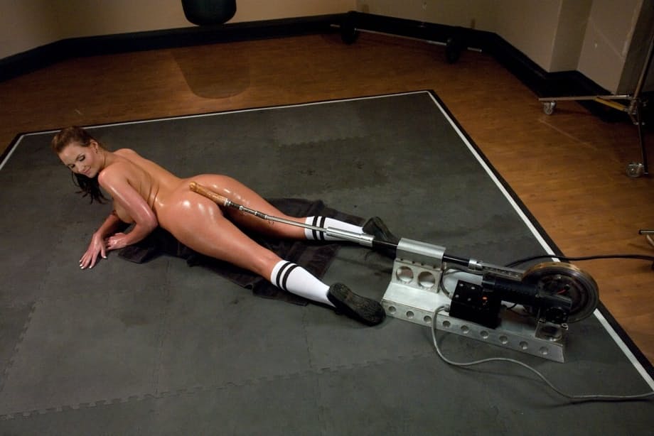 Fucking machine turns on sporty beauty with great boobs Phoenix Marie