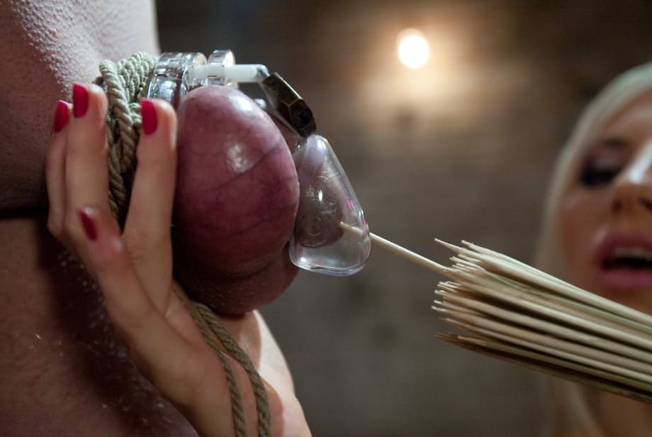 Blonde dominatrix Ashley Fires punishes naked slave in various ways