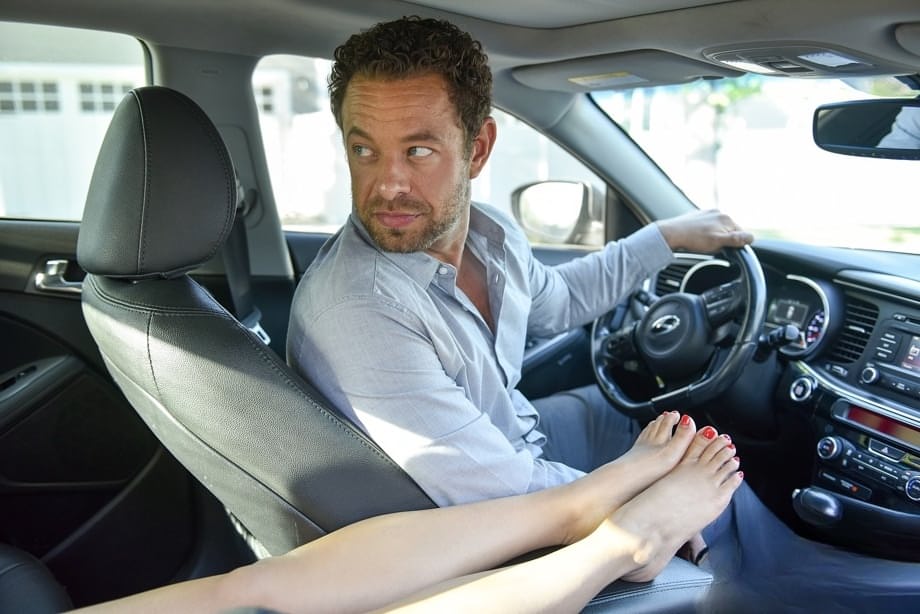Sharon Lee gives her chauffeur an arousing footjob after a foot fetish licking