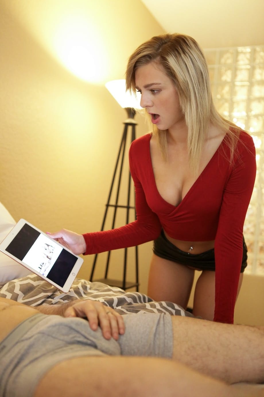 Blonde chick Tiffany Watson seduces her man in a black miniskirt and heels