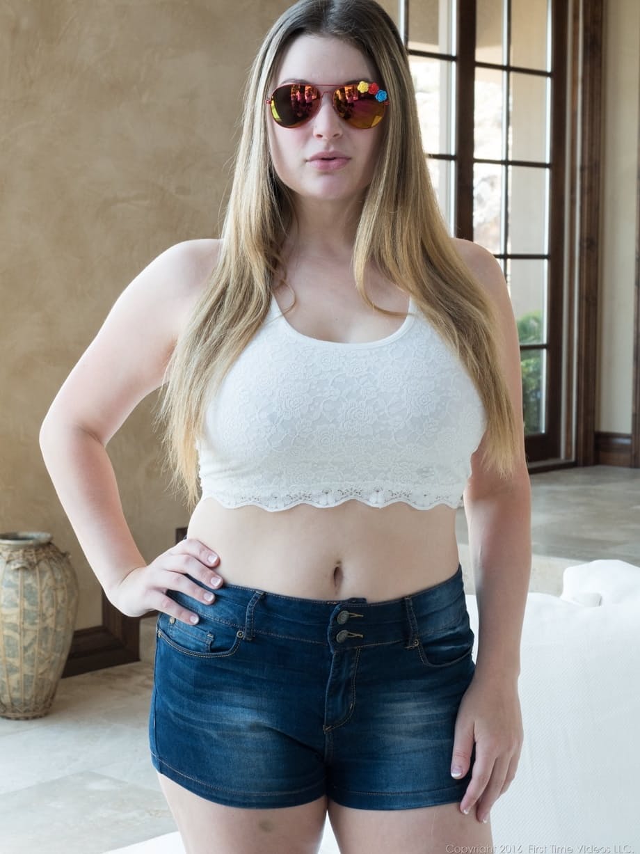 Danielle nudes her great big tits and remains in red, white, blue high heels