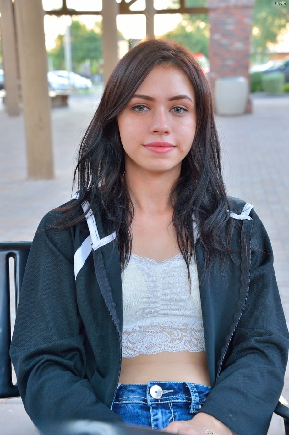 Petite brunette toys her asshole during an episode of public nudity