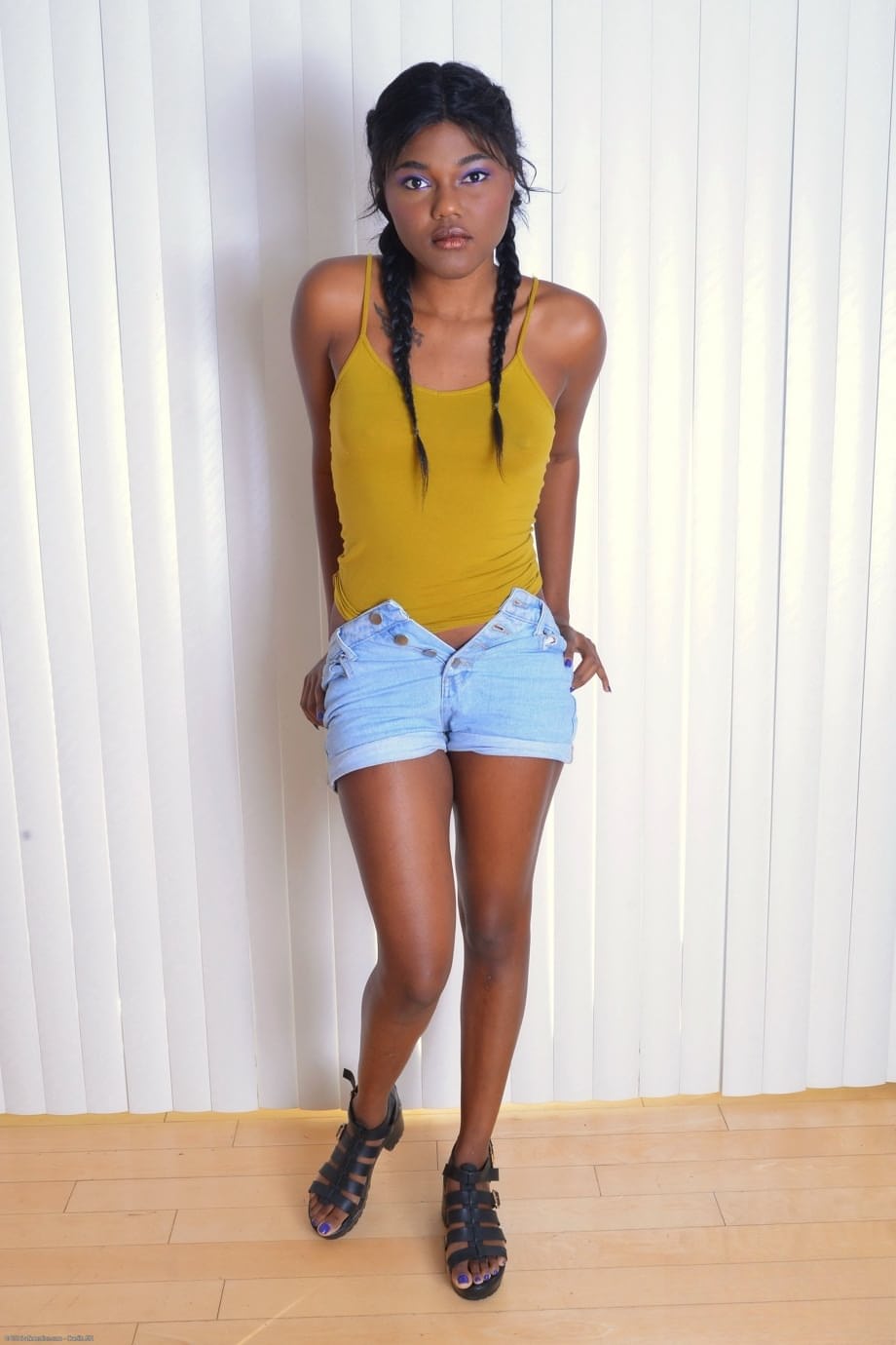 Beautiful ebony teen Yara Skye parts her ass and twat with painted fingernails