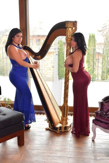 Busty sisters Sheila & Kesha Ortega bare massive tits & toy in music room