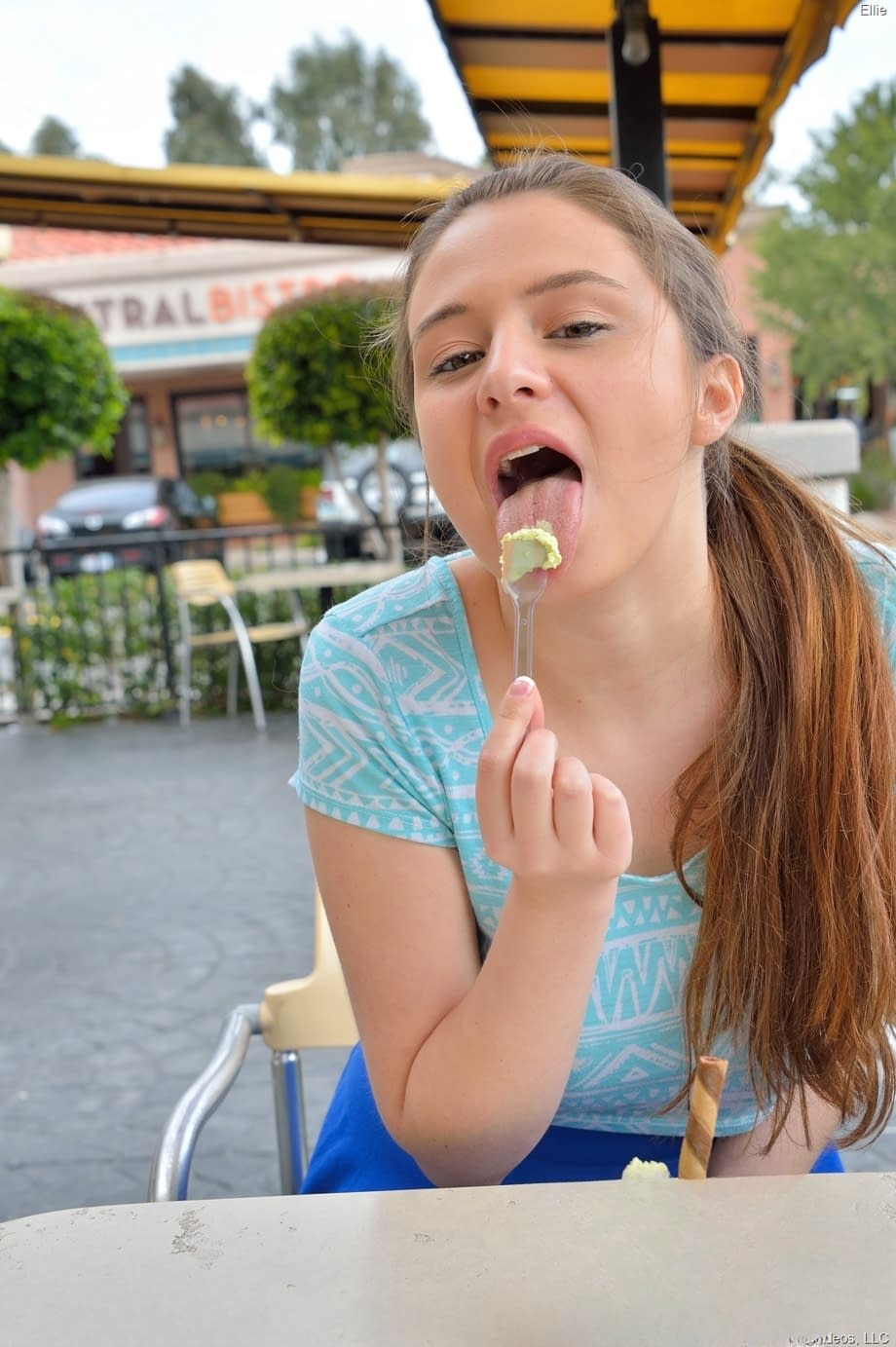 Shady chick Ellie in blue flashes gorgeous breasts on the terrace of cafe
