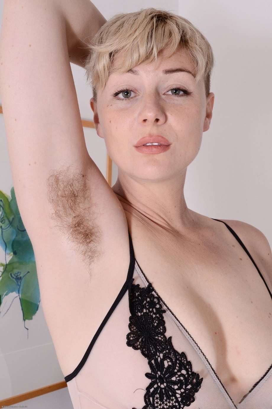 Attractive blonde Dakota Rose flaunts big ass & spreads her big hairy pussy