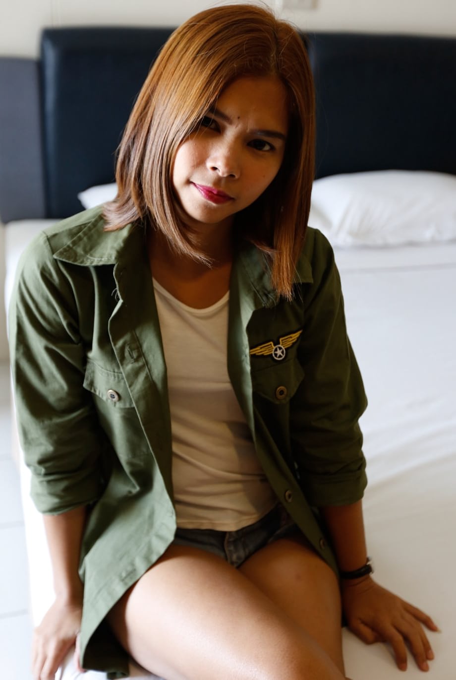 Pretty Thai babe with tiny tits Tam enjoys a strong penis in her trimmed pussy