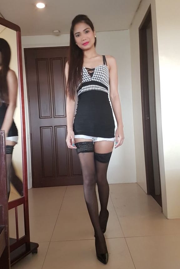 Guy jerks off looking at skinny Filipina in stockings and cums on her face