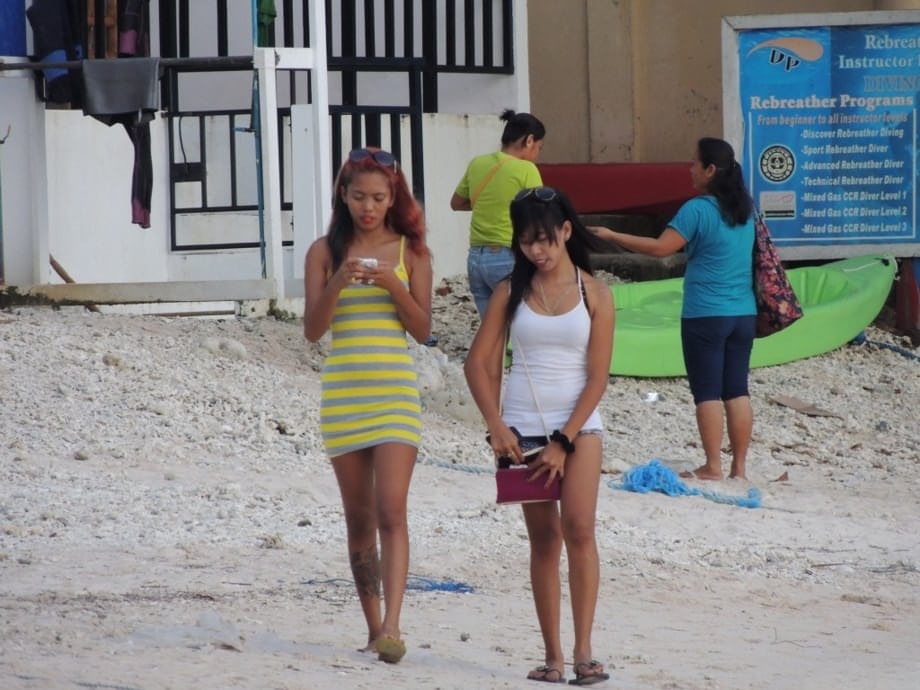 Hot little Asian sluts Shanelle & Bubbles pose & preen in skimpy beach outfits