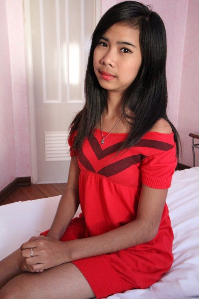 Lovely Filipina Akira strips & shows her fuzzy pussy and small tits