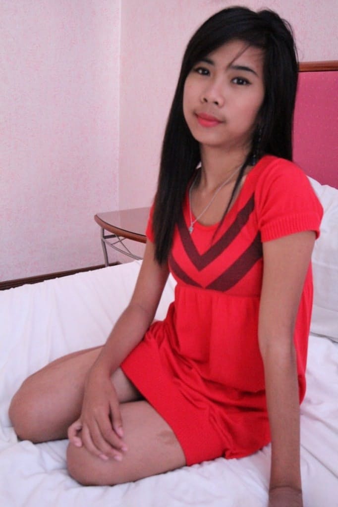 Lovely Filipina Akira strips & shows her fuzzy pussy and small tits