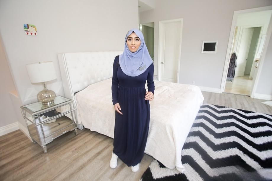 Charming Arab spreading legs to show pussy while wearing a hijab