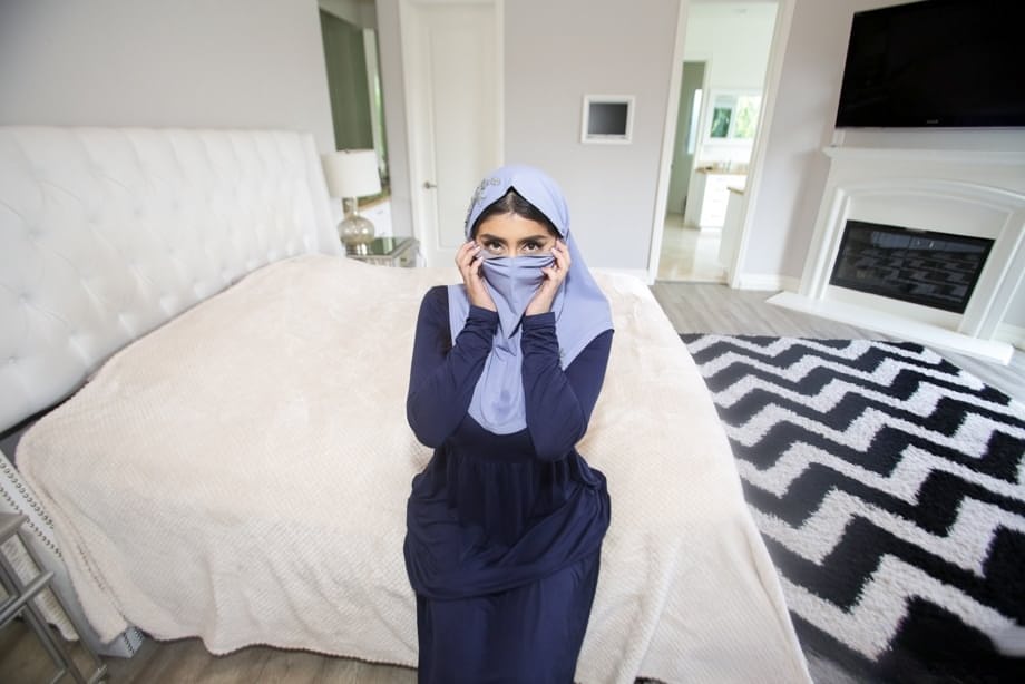 Charming Arab spreading legs to show pussy while wearing a hijab
