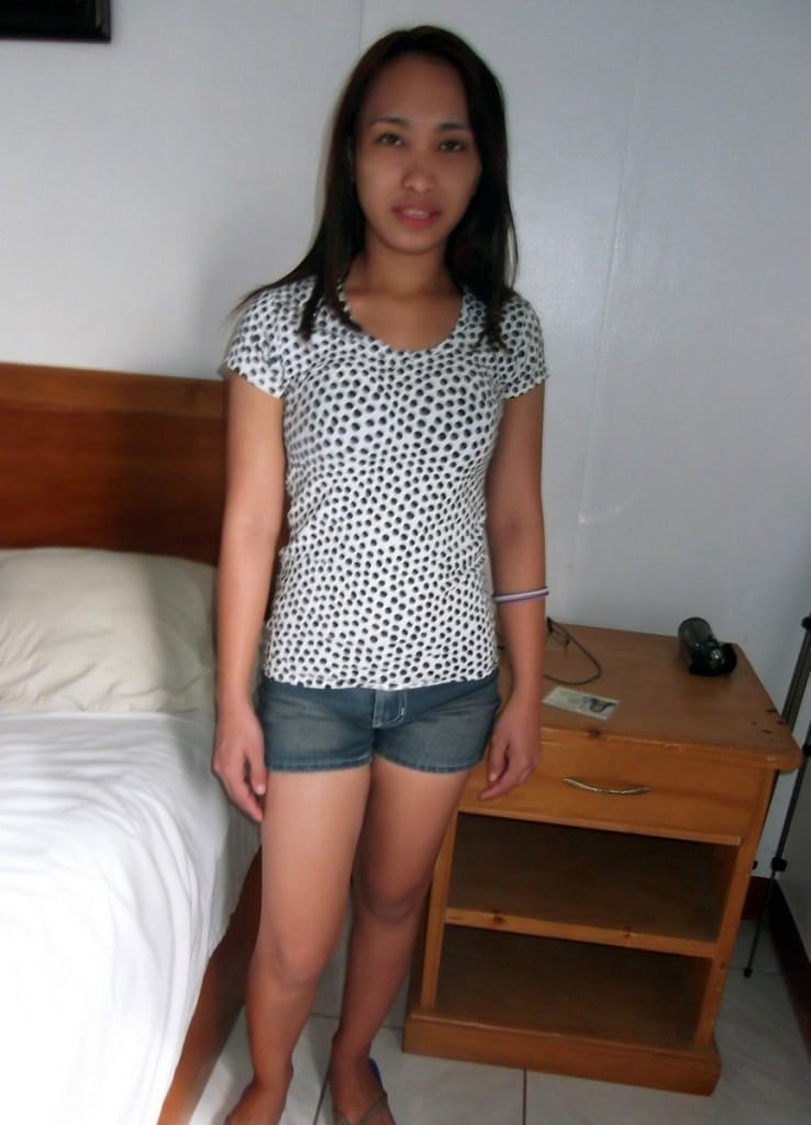 Tiny babe Caren shows her lovely naturals and poses nude in a hotel room
