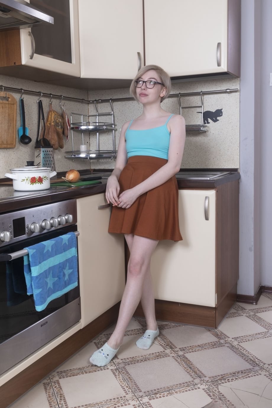 Amateur teen Abby shows off her hairy pussy & armpit in the kitchen