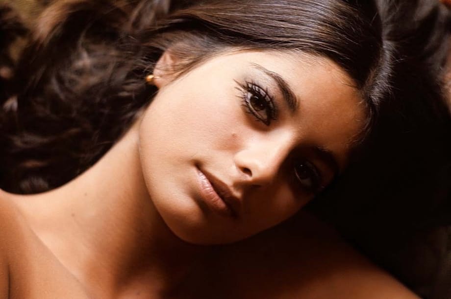 Brown haired 70's model Jennifer Liano flaunts her big natural knockers
