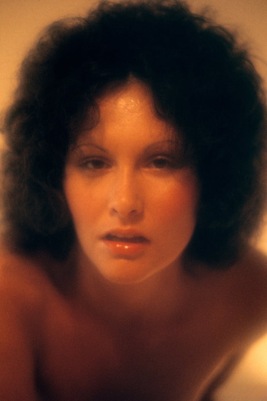 Classic retro centerfold Linda Lovelace enjoys solo masturbation on her bed
