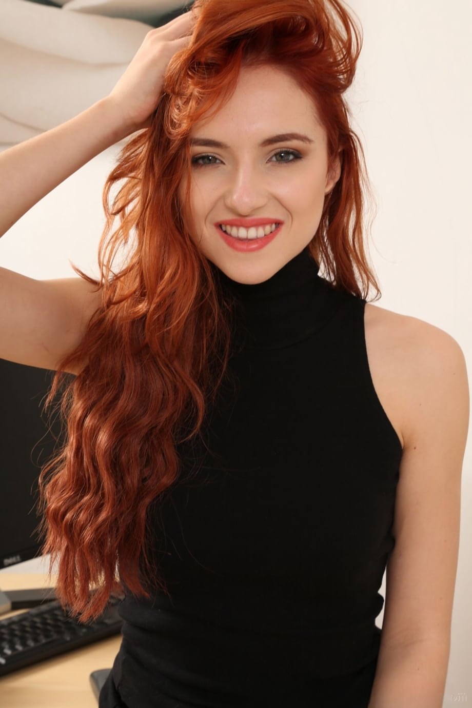 Model with red wavy hair Sophia Blake undresses & poses in sheer tights
